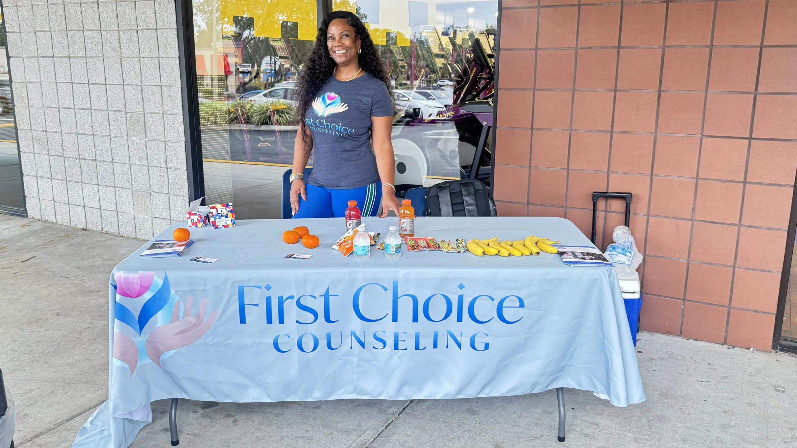 Kisha Choice at a First Choice Counseling outreach table